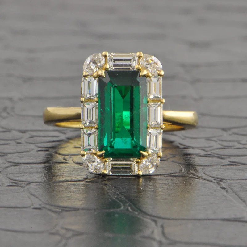 Ladies unique boho spiral engagement rings -Elongated Emerald and Diamond Halo Ring in Yellow Gold