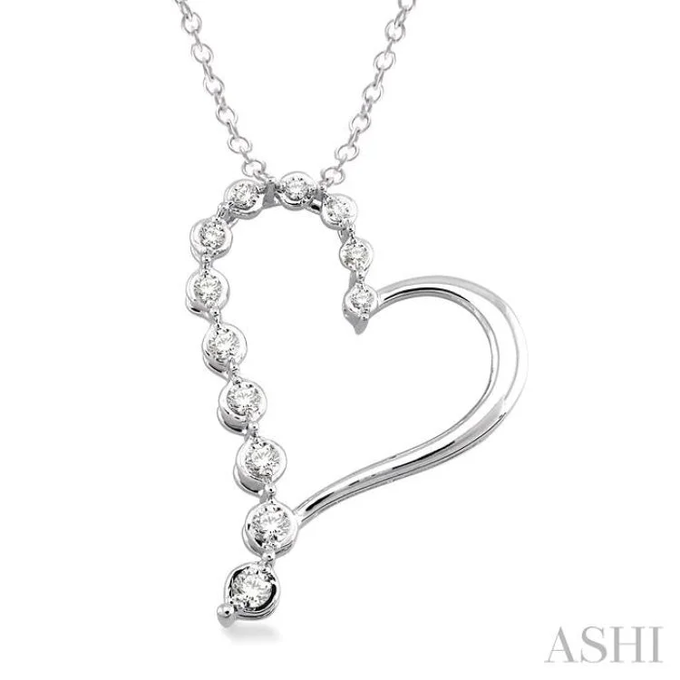 Ladies delicate emerald pendant necklaces -1/10 Ctw Round Cut Diamond Heart Pendant in Sterling Silver with Chain