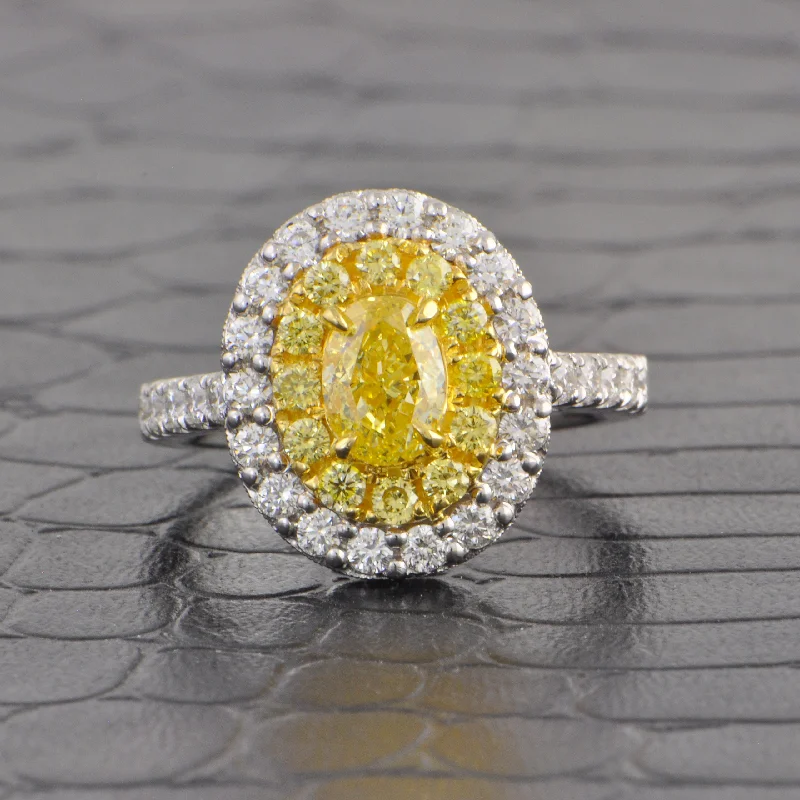 Ladies bold diamond petal engagement rings -Fancy Yellow Oval Cut Diamond Halo Ring in 18k Gold