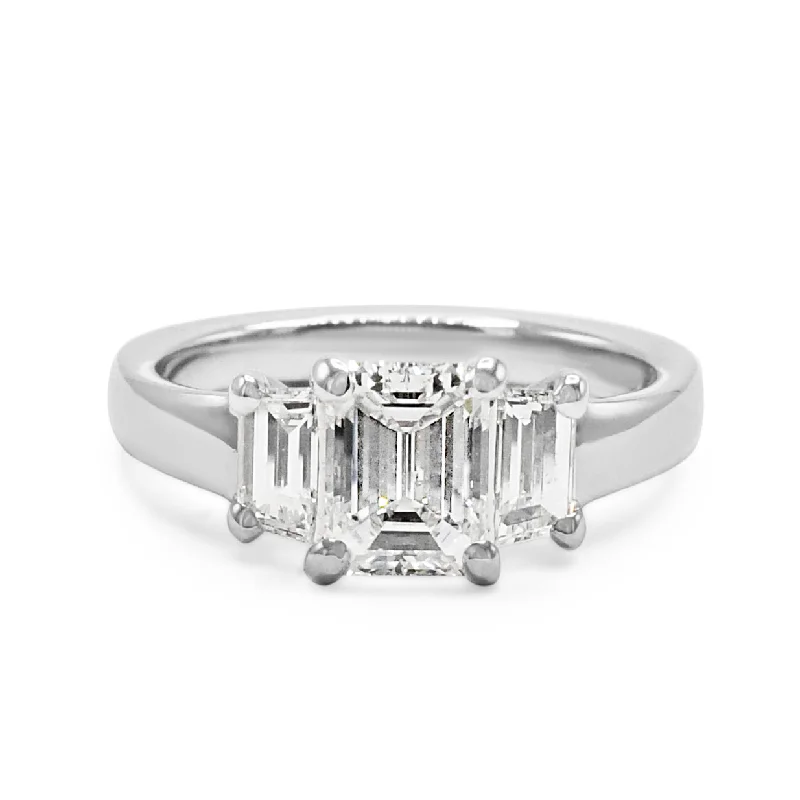 Modern rose gold twist ring for women -GIA Certificated Emerald Cut Diamond Three Stone Ring