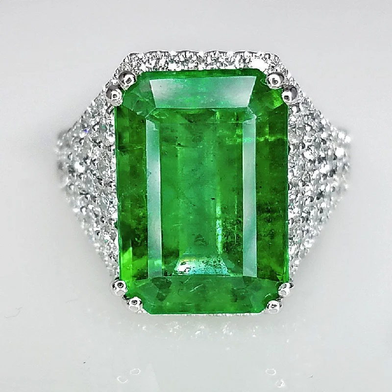 Modern gold halo ring for ladies -8.65 Total Carat Emerald and Diamond Pave-Set Ladies Ring GIA