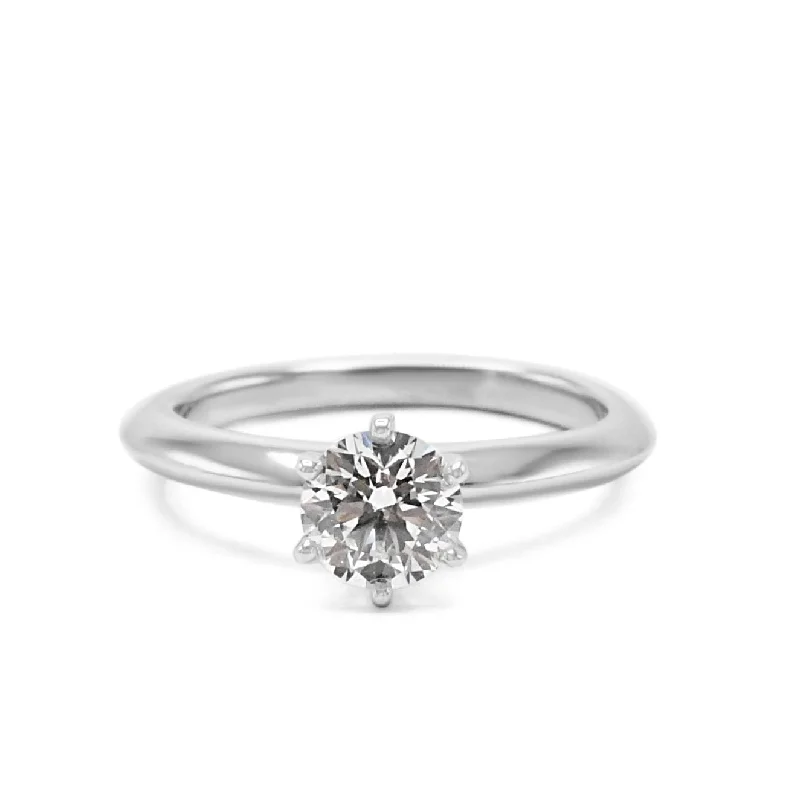 Modern gold halo ring for ladies -Tiffany & Co. Solitaire Diamond Ring - Platinum