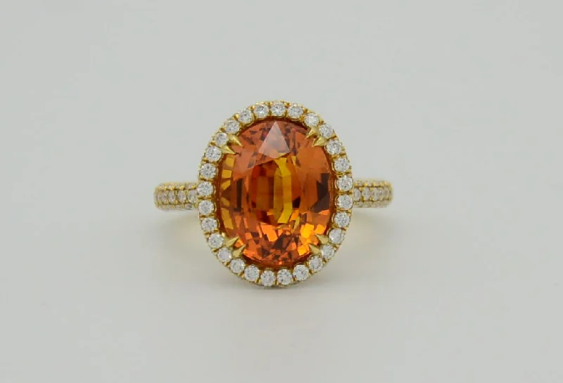 Modern silver knot ring for women -9.28 Total Carat Orange Sapphire and Diamond Halo Ladies Ring. GIA Certified.